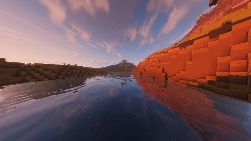 Dynamic Rivers — a river carving through mesa cliffs